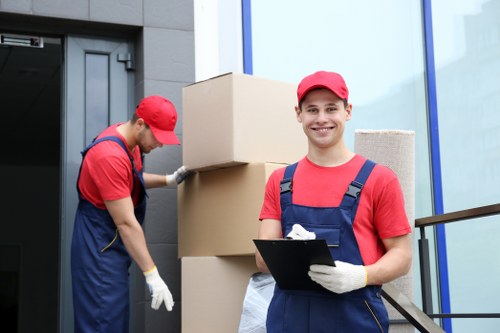 House removal team preparing a move in Soho with boxes and furniture