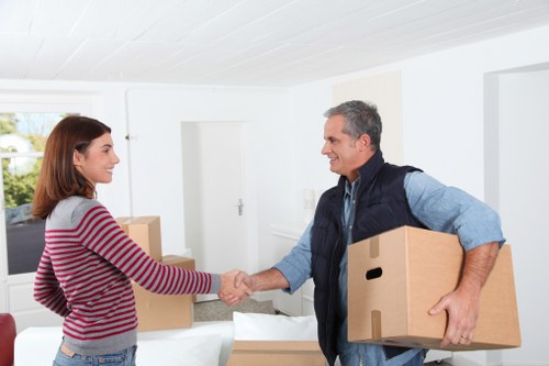 Careful loading of business items during a Soho commercial move